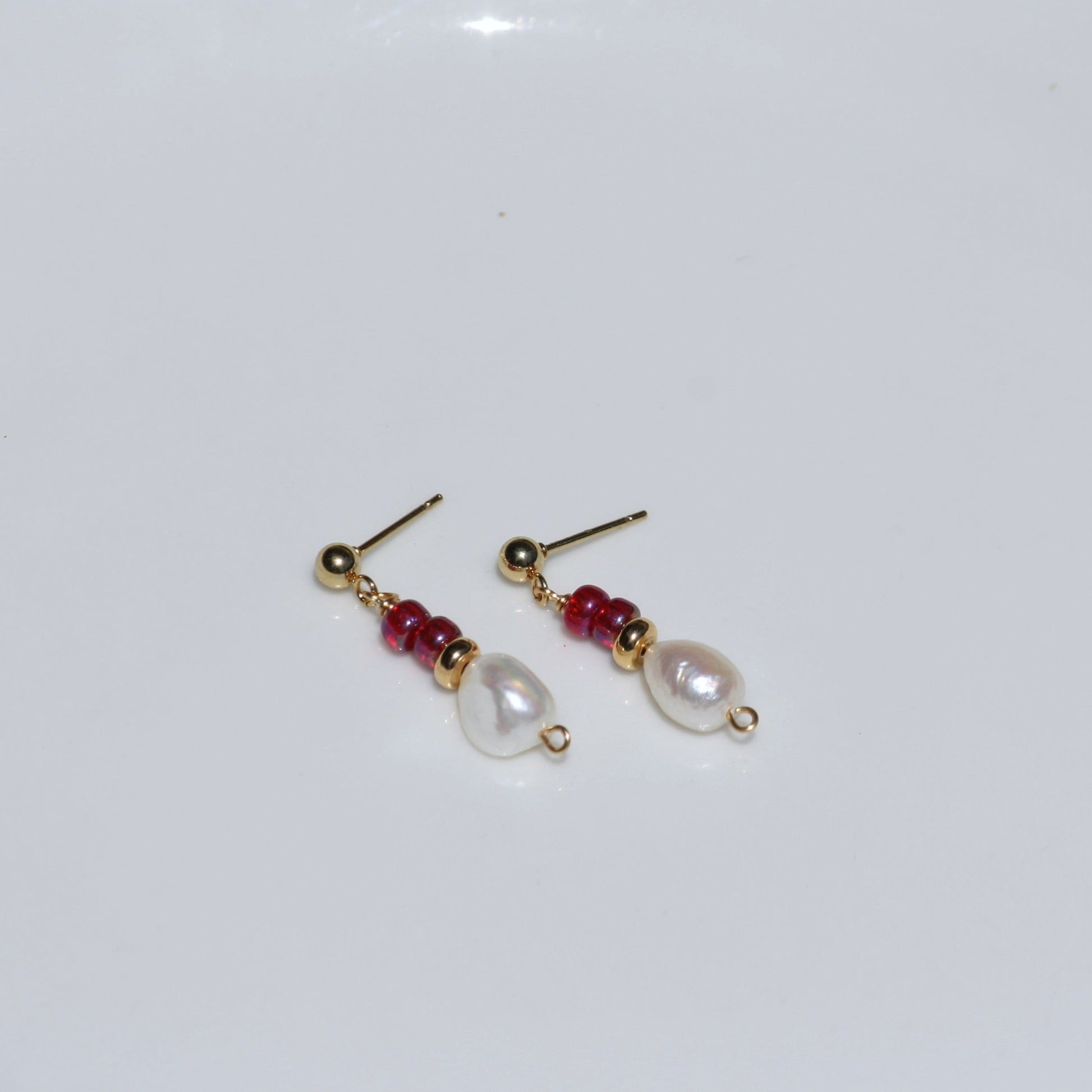 Simple pearl earrings with ball post finding.