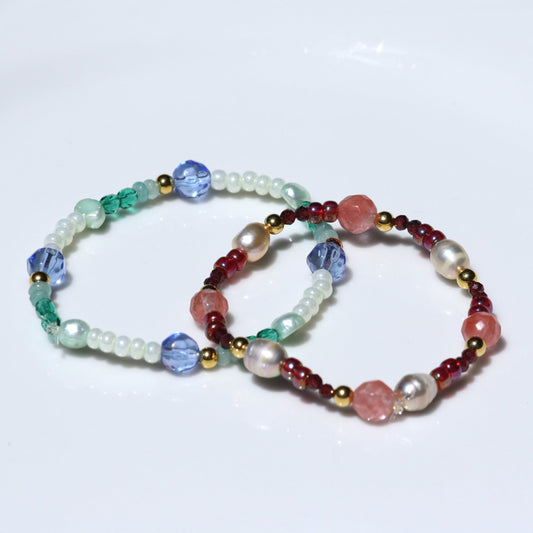 Stretchy beaded bracelets in color blue and pink.