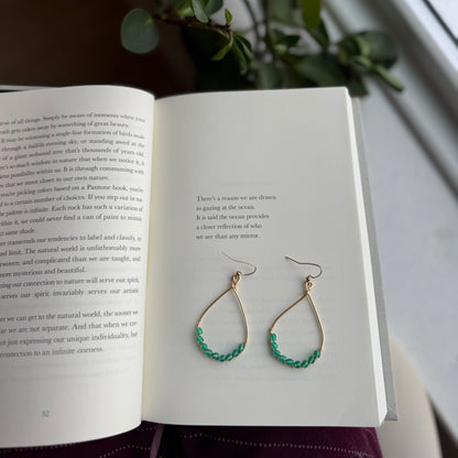 Green beaded gold hoop earrings for winter