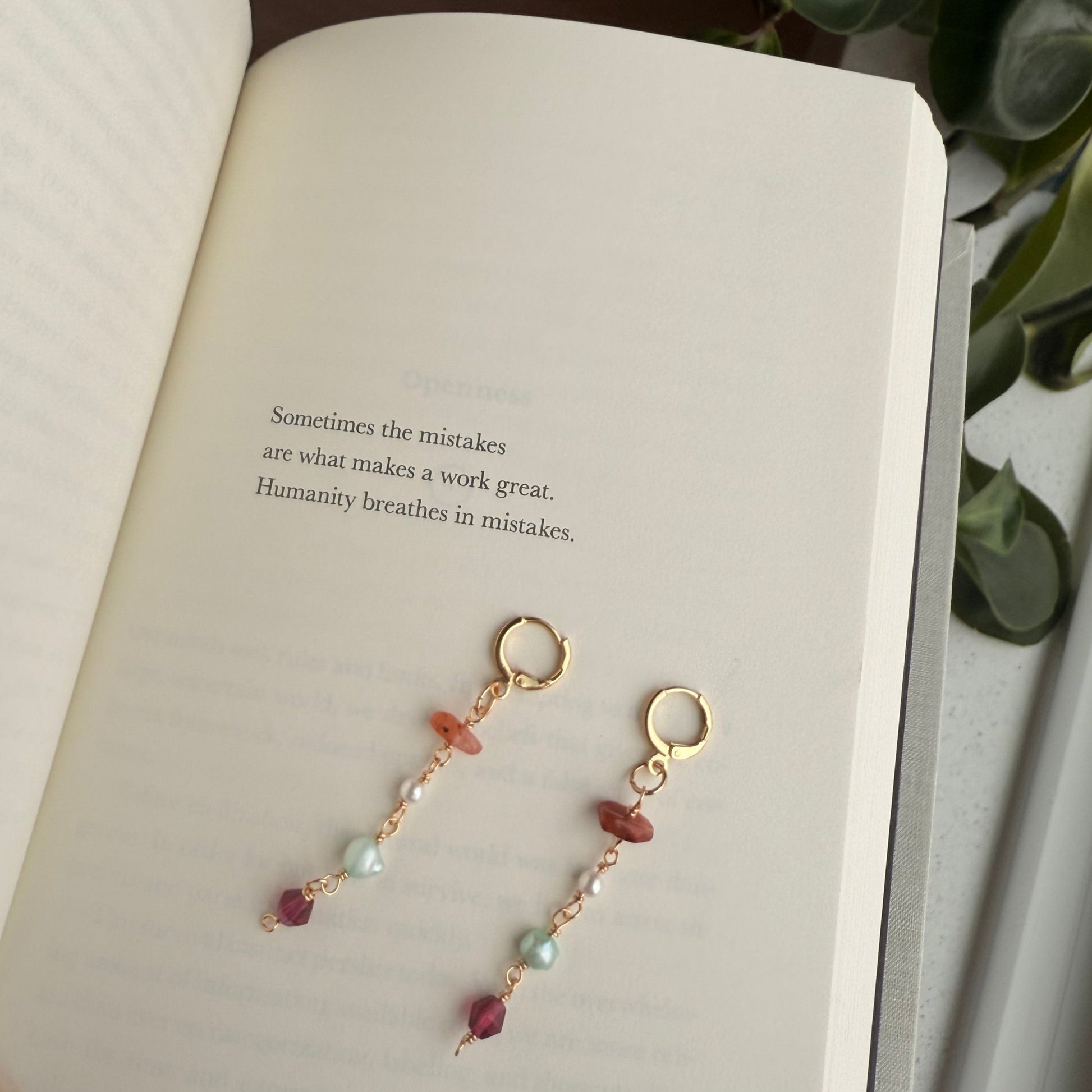 Dangle earrings with book quote