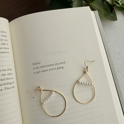 Pearl hoop earrings.